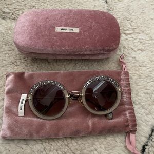 Miu Miu round grey sunglasses